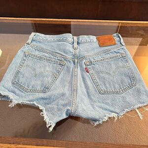 Levi 501 shorts with distressing